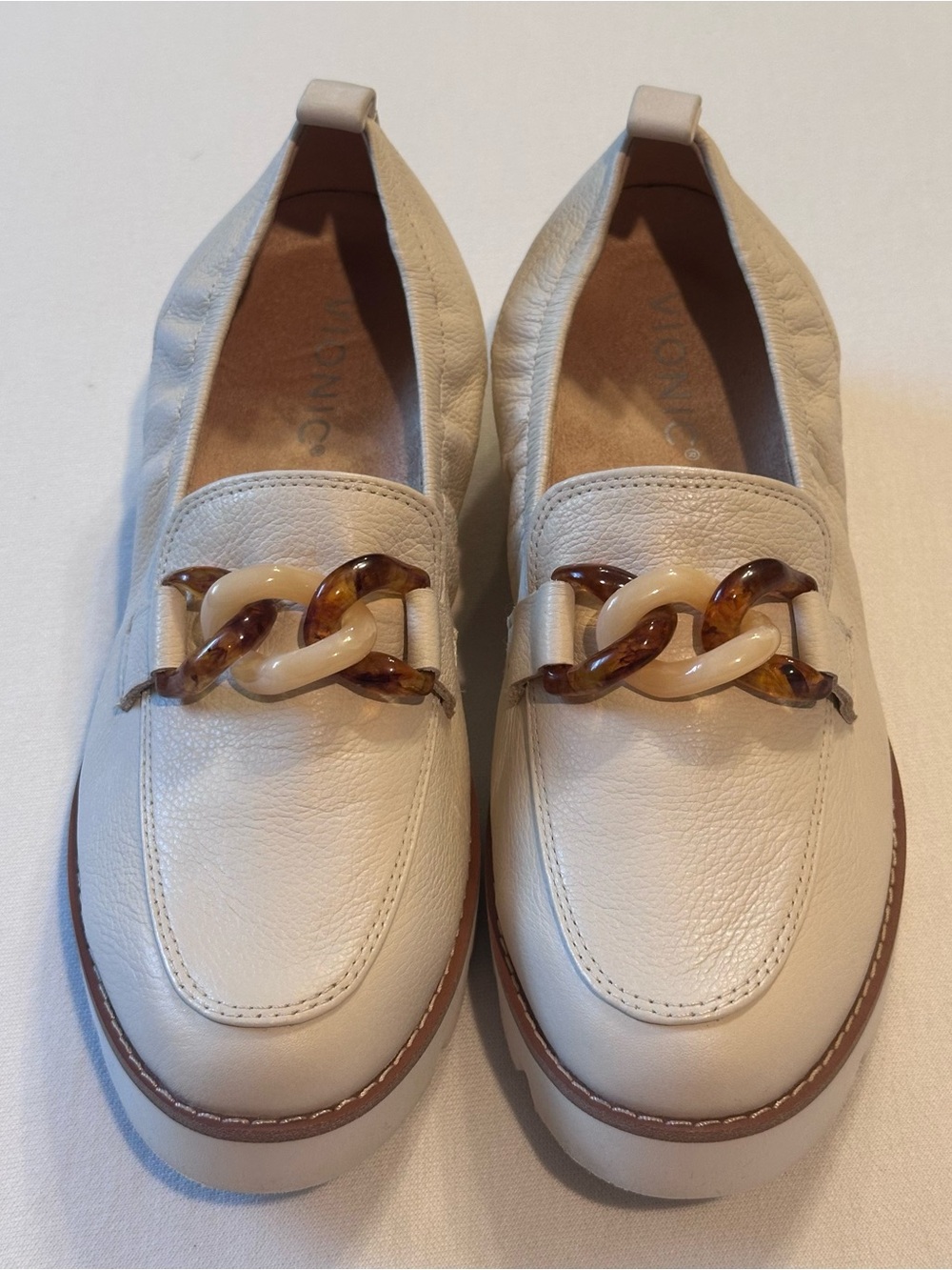 Vionic ‘Cynthia’ Slip on Leather Loafers with buckle. Size 6. Color is Cream